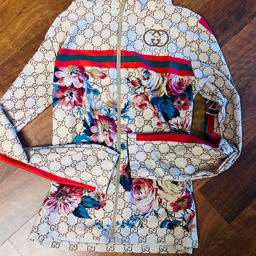 Gucci Cream and Red Bomber Jacket with Athletic Style